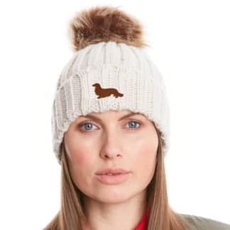 Long Haired Dachshund Daxi Clothing Gifts, Faux Fur Pom Pom Chunky Knit Embroidered Beanie From The House Of Dog.
